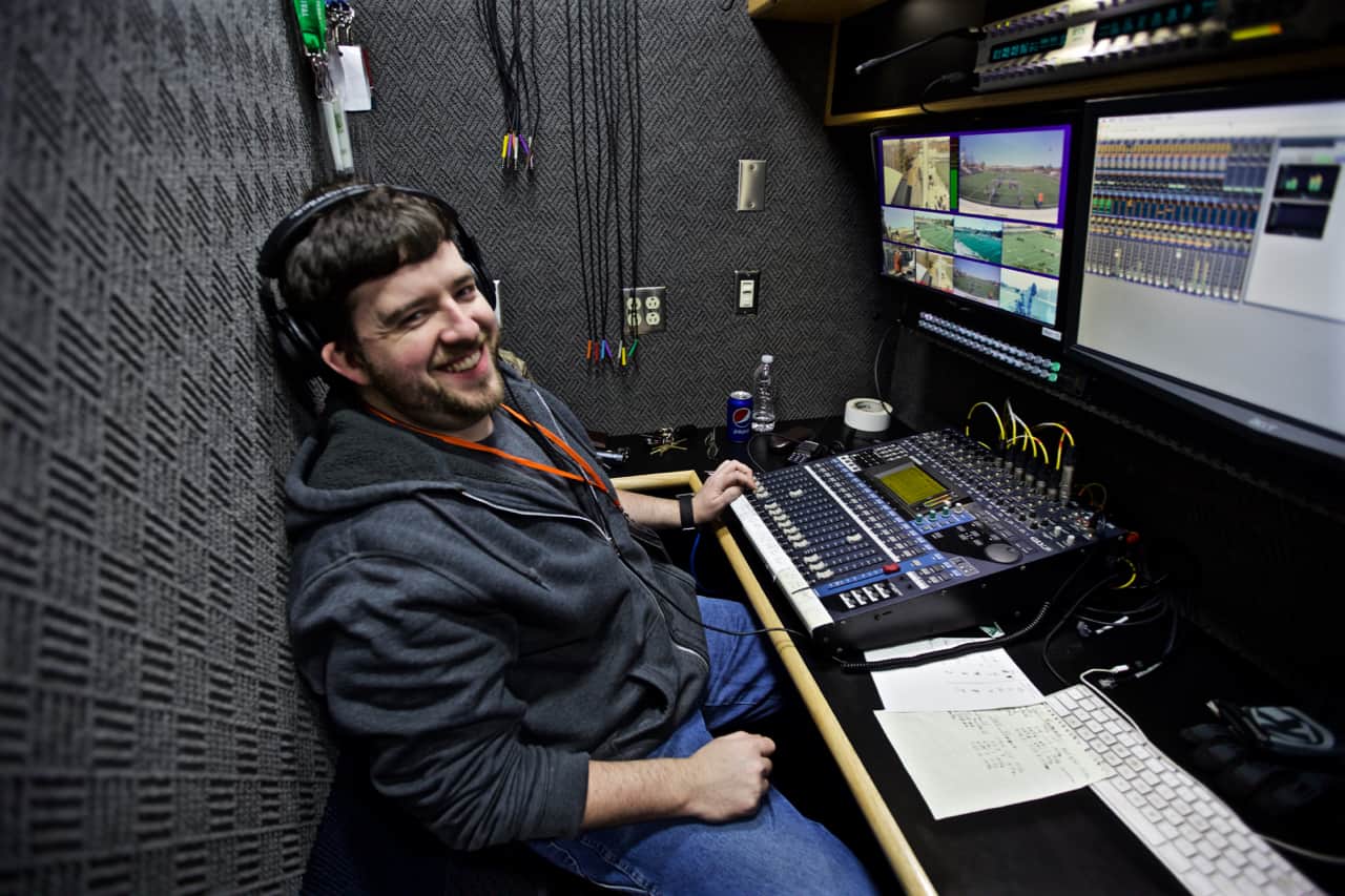 Production control room with team member