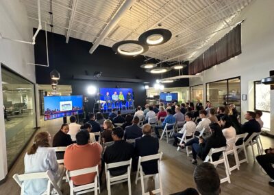 Town Hall with live audience and multiple presenters